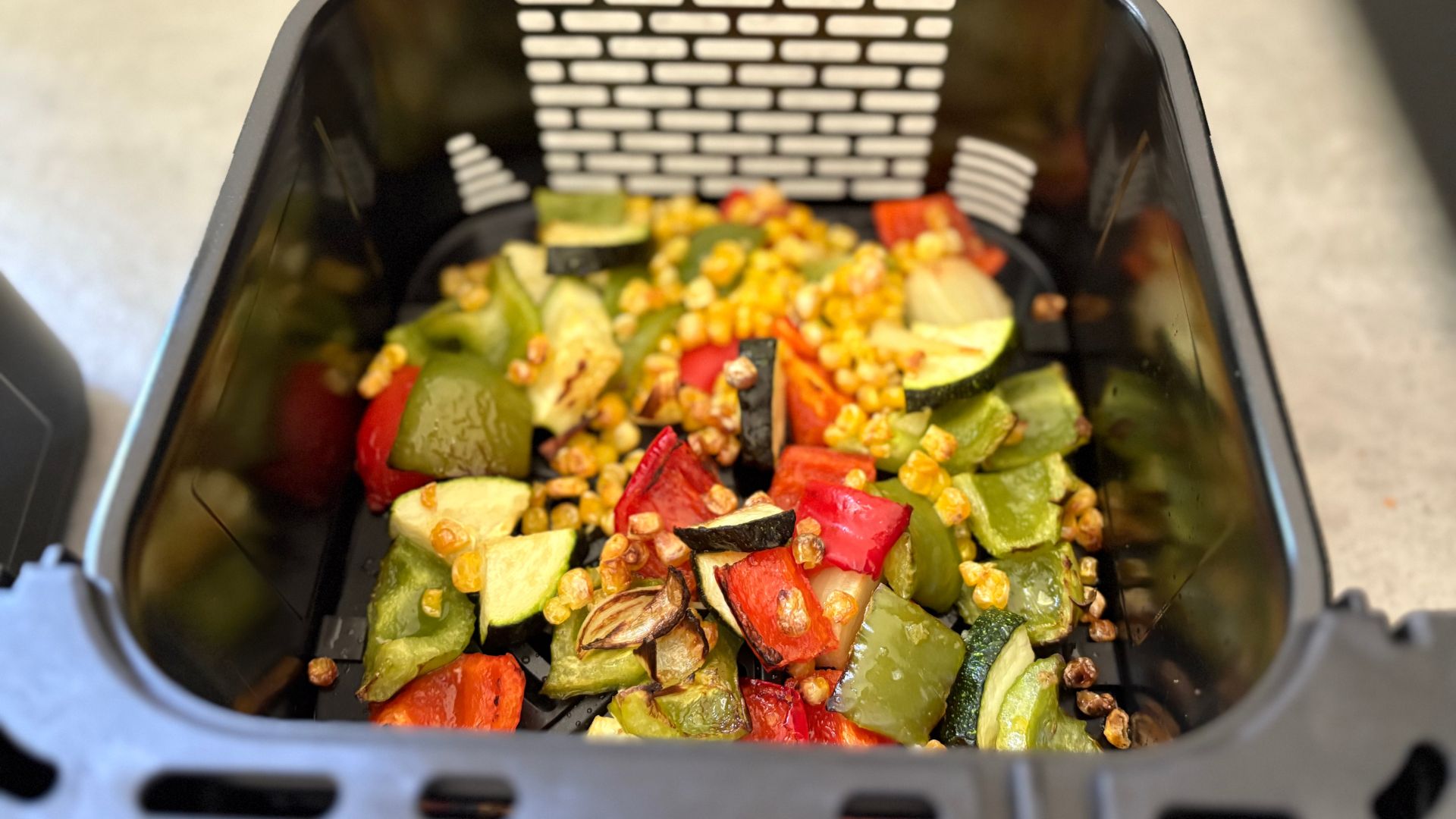Vegetables in a drawer of the Salter VertiCook Air Fryer