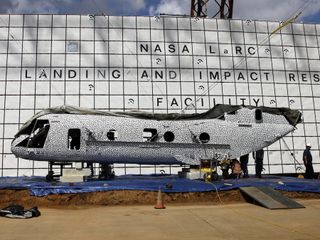 NASA's Langley Research Center engineers are scheduled to crash test a former Marine helicopter at the historic Landing and Impact Research facility. The fuselage is painted in black polka dots as part of a high speed photographic technique.