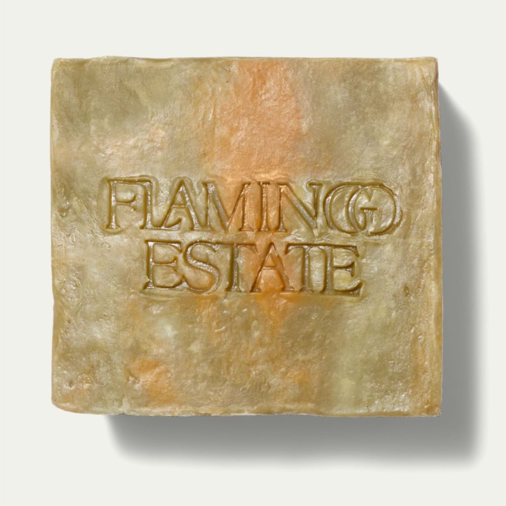 Green Goddess soap brick with Flamingo Estate logo imprinted