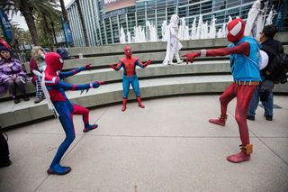 Spiderman cosplayers pose for photos at WonderCon 2022 Day 2 at Anaheim Convention Center on April 02, 2022 in Anaheim, California