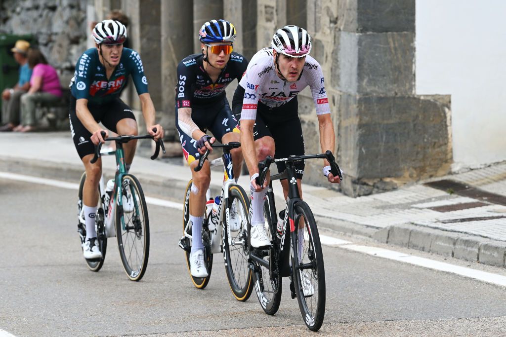 PAJARES SPAIN SEPTEMBER 01 LR Pablo Castrillo of Spain and Team Equipo Kern Pharma Aleksandr Vlasov of Russia and Team Red Bull Bora hansgrohe and Pavel Sivakov of France and UAE Team Emirates compete in the breakaway during the La Vuelta 79th Tour of Spain 2024 Day 15 a 143km stage from Infiesto to ValgrandePajares Cuitu Negru 1835m UCIWT on September 01 2024 in Pajares Spain Photo by Dario BelingheriGetty Images