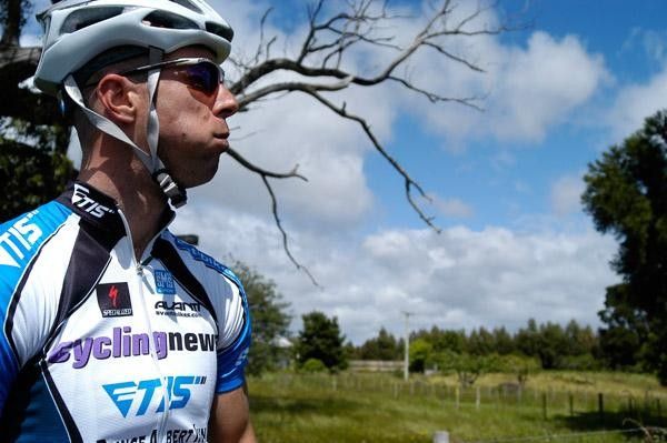 Karl Menzies munches and looks out on the great view
