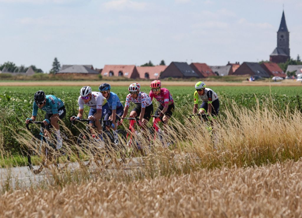 BB HotelsKTM teams French rider Alexis Gougeard L Totalenergies teams Norwegian rider Edvald Boasson Hagen 2nd L IsraelPremier Tech teams Australian rider Simon Clarke 3rd L EF EducationEasypost teams Danish rider Magnus Cort Nielsen C EF EducationEasypost teams American rider Neilson Powless 2nd R and IntermarcheWantyGobert Materiaux teams Dutch rider Taco Van Der Hoorn R cycle in a breakaway during the 5th stage of the 109th edition of the Tour de France cycling race 1537 km between Lille and Arenberg Porte du Hainaut in northern France on July 6 2022 Photo by Thomas SAMSON AFP Photo by THOMAS SAMSONAFP via Getty Images