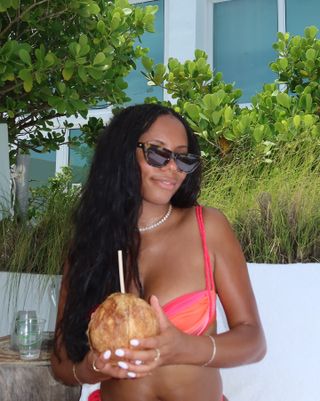 Sierra Mayhew wearing a pink and orange Baobob bikini