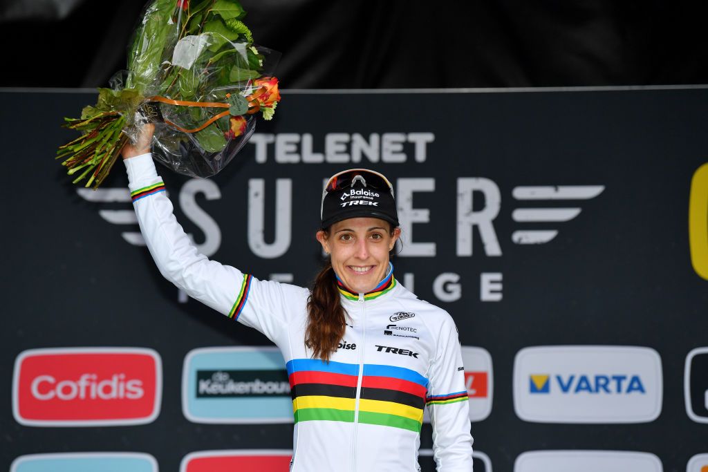 RIJKEVORSEL BELGIUM NOVEMBER 20 Lucinda Brand of The Netherland and Team Baloise Trek Lions celebrates winning the race on the podium ceremony after the 10th Superprestige Merksplas 2021 Womens Elite Superprestige2022 SPMerksplas on November 20 2021 in Rijkevorsel Belgium Photo by Luc ClaessenGetty Images