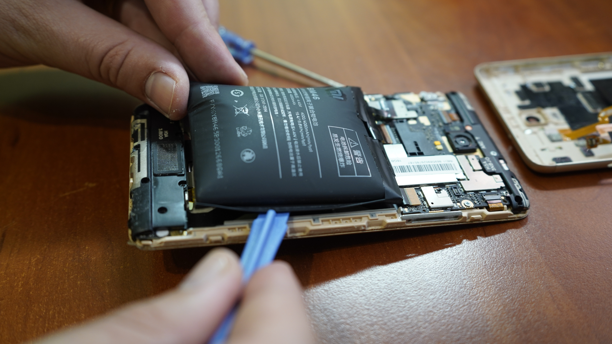 Phone with a heavily swollen battery