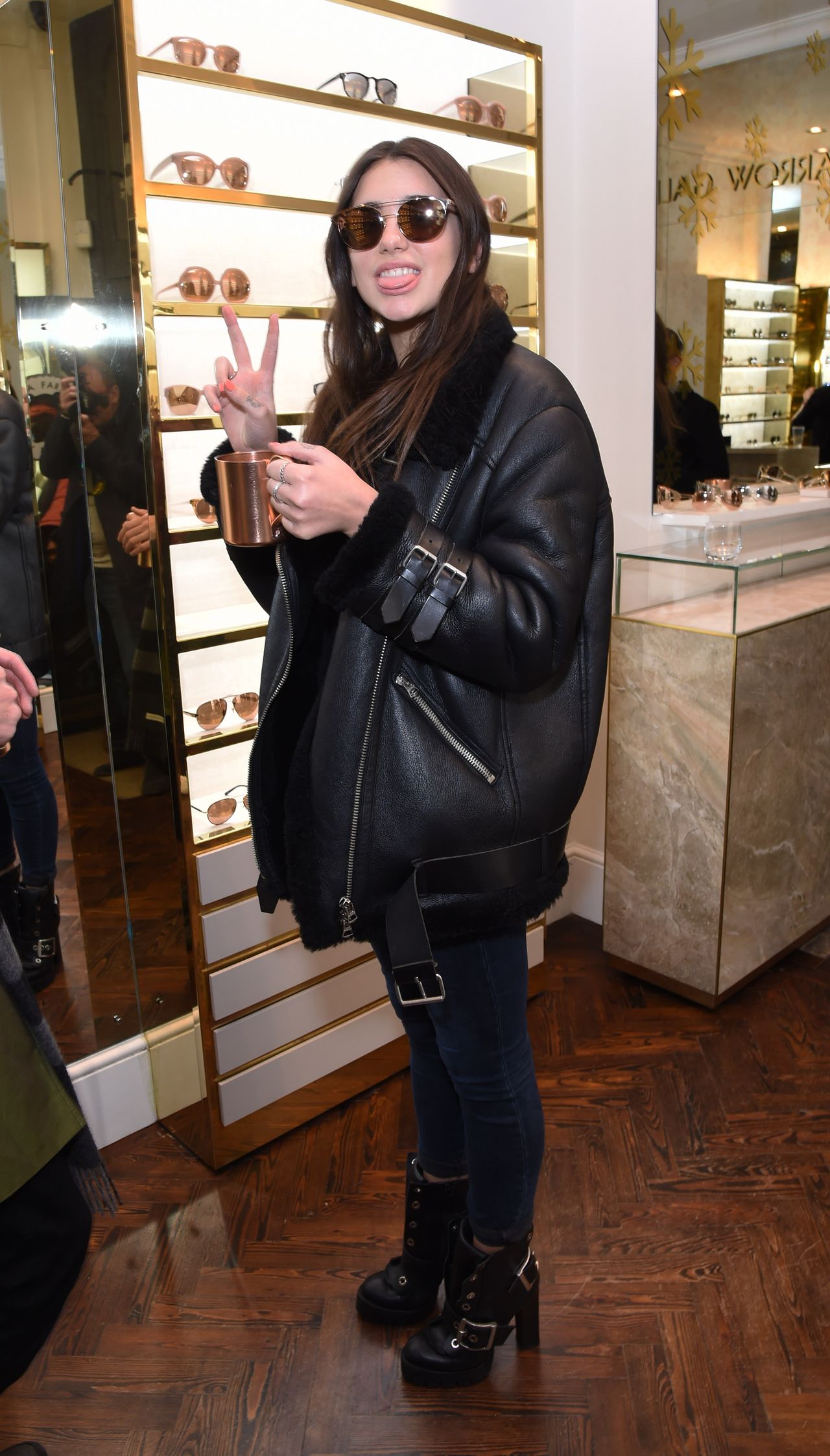 LONDON, ENGLAND - NOVEMBER 19: Dua Lipa attends the Mount Street Christmas Lights switch on hosted by Linda Farrow featuring the launch of Julian The Bear, the Linda Farrow Holiday Bear in aid of Great Ormond Street Hospital Children's Charity, on November 19, 2015 in London, England. (Photo by David M. Benett/Dave Benett/Getty Images)