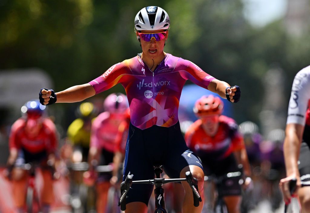 FOLIGNO ITALY JULY 11 Barbara Guarischi of Italy and Team SD Worx Protime celebrates at finish line the victory of her teammate Lotte Kopecky of Belgium and Team SD Worx Protime during the 35th Giro dItalia Women 2024 Stage 5 a 108km stage from Frontone to Foligno UCIWWT on July 11 2024 in Foligno Italy Photo by Luc ClaessenGetty Images