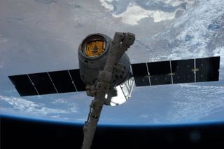 SpaceX Dragon Grappled to Canadarm2