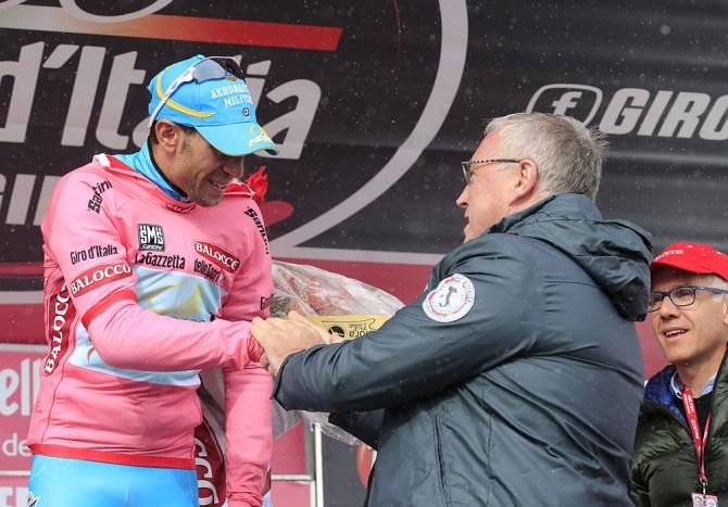 Vincenzo Nibali (Astana) is congratulated by Pat McQuaid