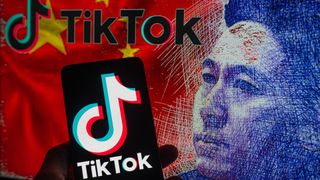 TikTok logo seen on mobile with TikTok CEO Shou Zi Chew sketch displayed on screen. On 23 March 2023 in Brussels, Belgium. 