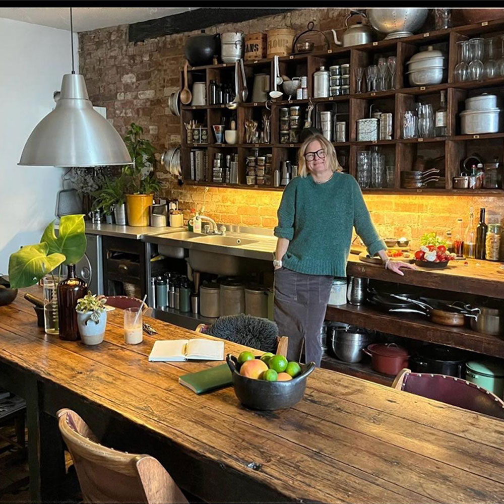 picture of Abi Partridge a private chef in her rustic kitchen