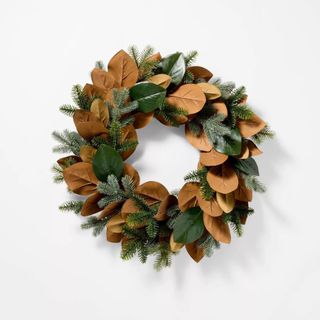 Faux magnolia wreath with pine stems