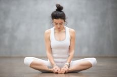 Woman doing fertility yoga