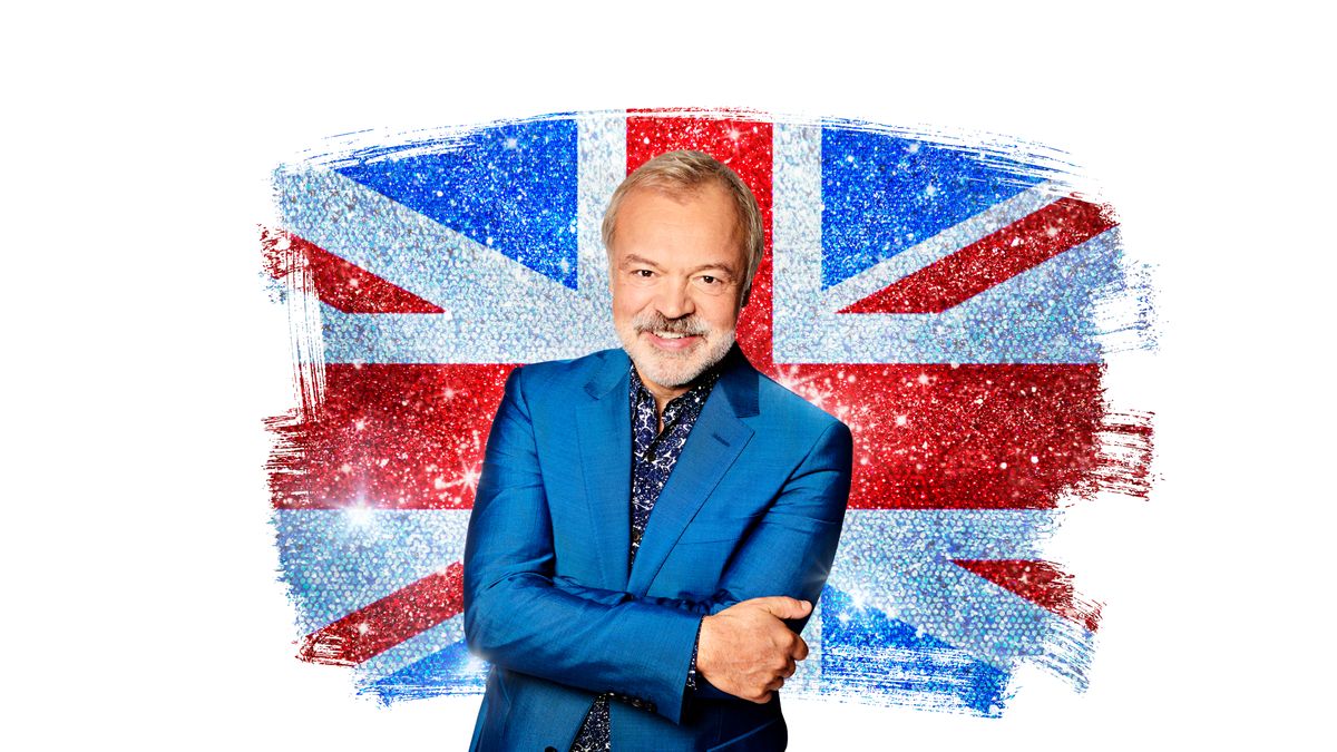 Graham Norton photographed against a glittery Union Jack backdrop for Eurovision 2022.