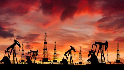 An oilfield in Iran at sunset.