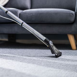 wet vacuum cleaning grey carpet