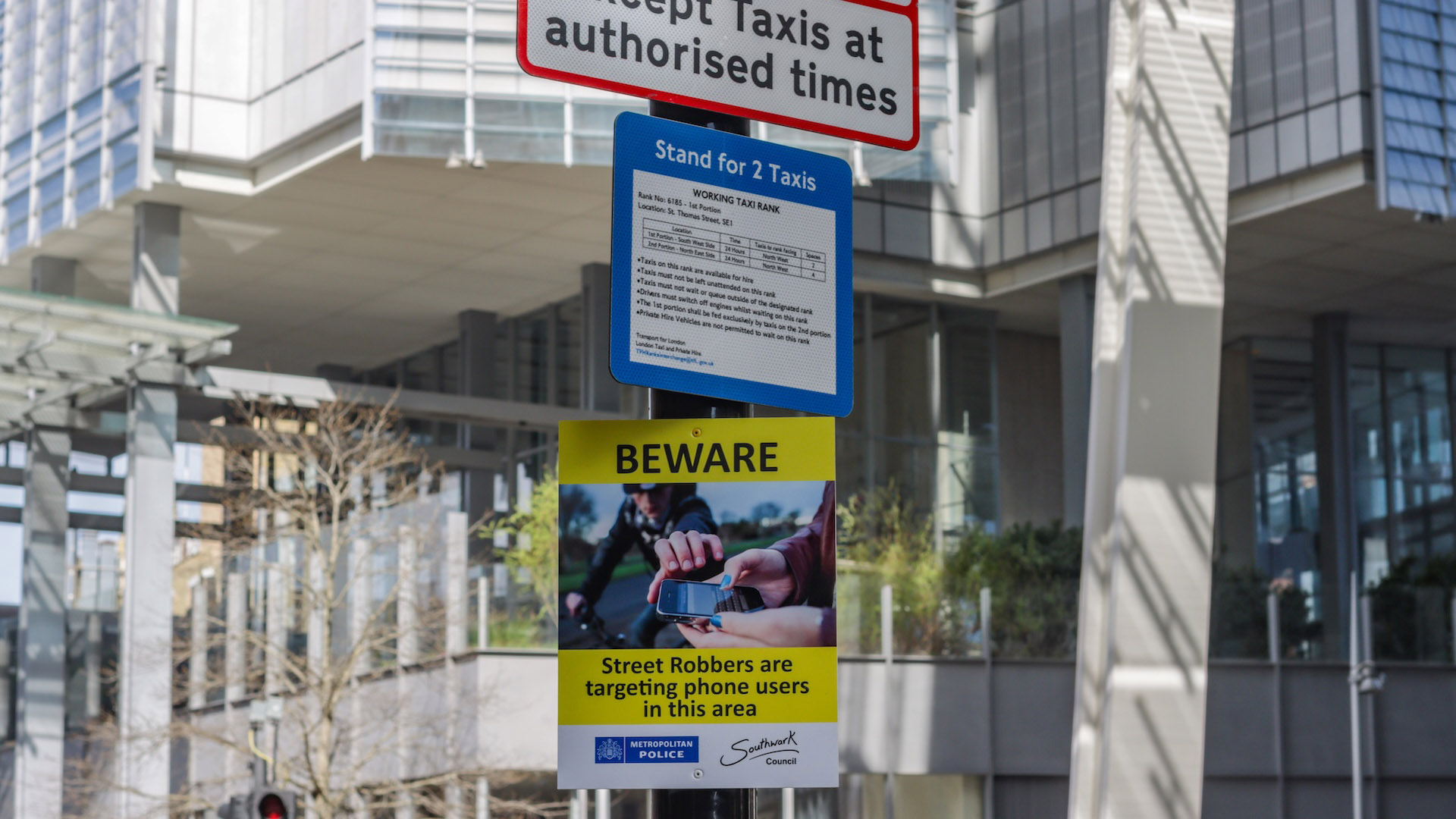 Warning Sign at London Bridge in Southwark, London, cautioning pedestrians and tourists against the exploding increase in crime in the UK capital city.