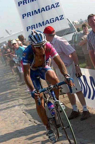 Enrico Franzoi (Lampre) with jersey unzipped - unusual for a spring classic!