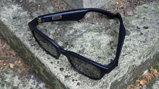 The Bose Frames pictured on a stone surface