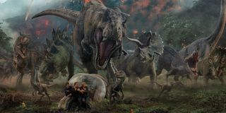 Jurassic World: Fallen Kingdom dinosaurs rampaging towards human survivors