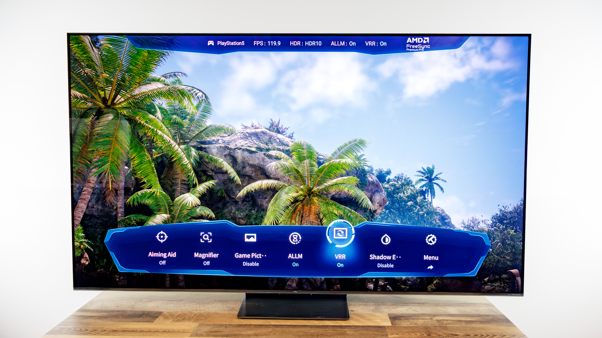 TCL QM7L 75-inch TV on a desk