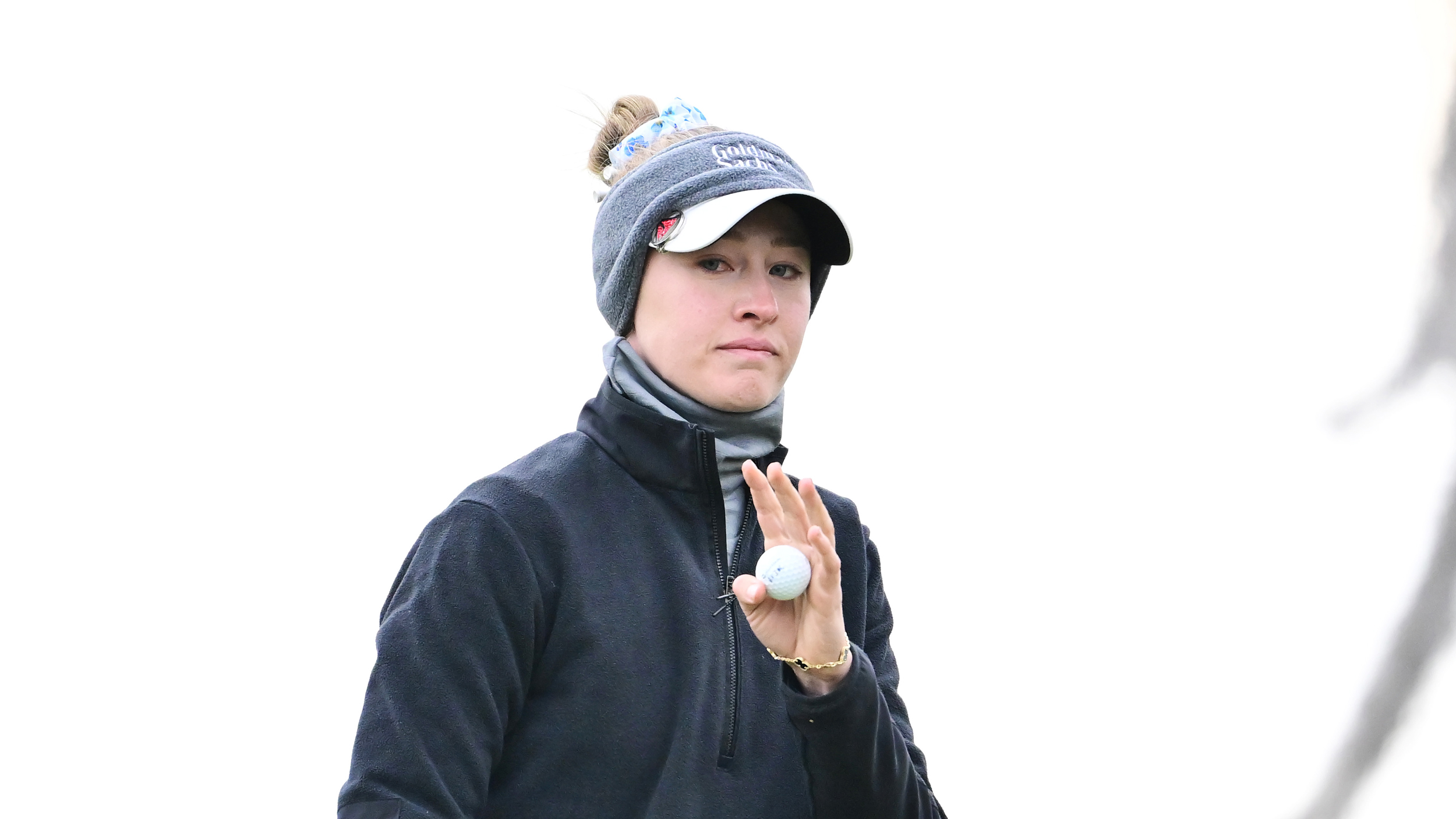 Nelly Korda waves to the camera with a golf ball in her hand during round three of the 2026 Hilton Grand Vacations Tournament of Champions