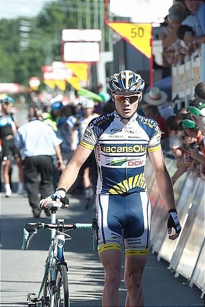Pim Ligthart (Vacansoleil-DCM) walks across the finish line.