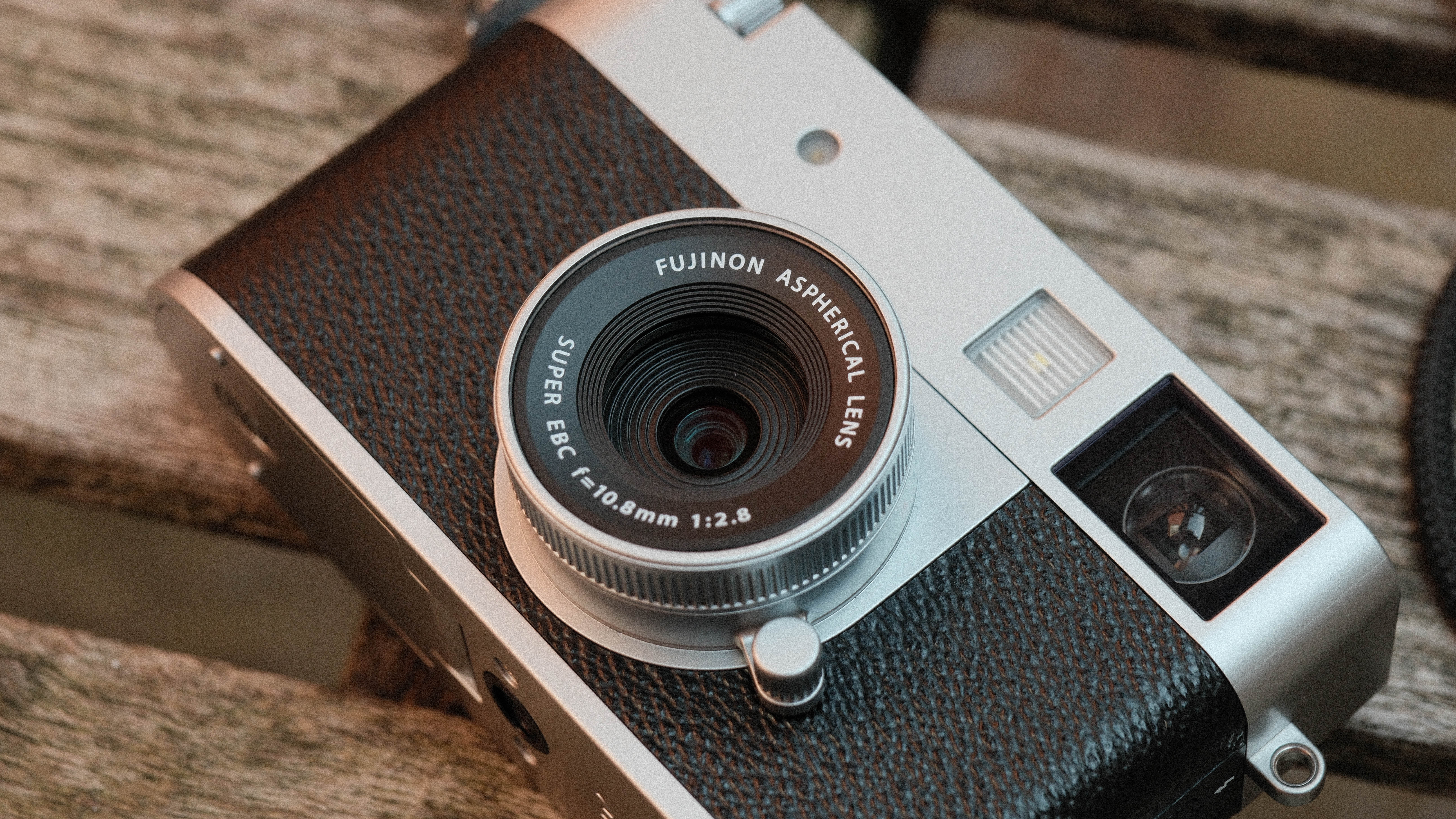 Fujifilm X Half camera on a wooden bench