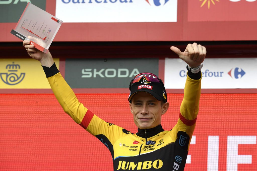 Team JumboVismas Danish rider Jonas Vingegaard celebrates on the podium winning the stage 16 of the 2023 La Vuelta cycling tour of Spain a 120 km race between Liencres and Bejes on September 12 2023 Photo by MIGUEL RIOPA AFP Photo by MIGUEL RIOPAAFP via Getty Images