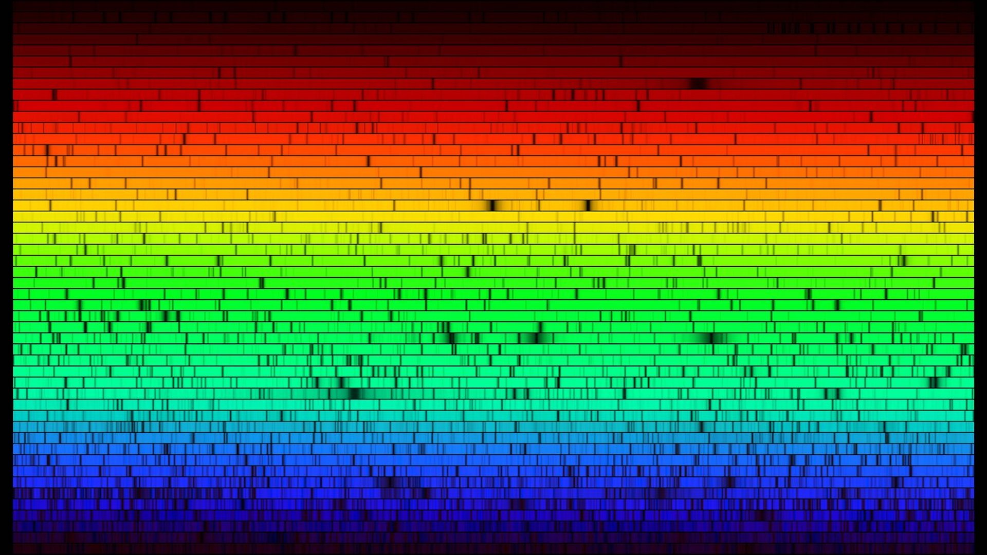 rainbow of brightly colored bars with small black lines through them