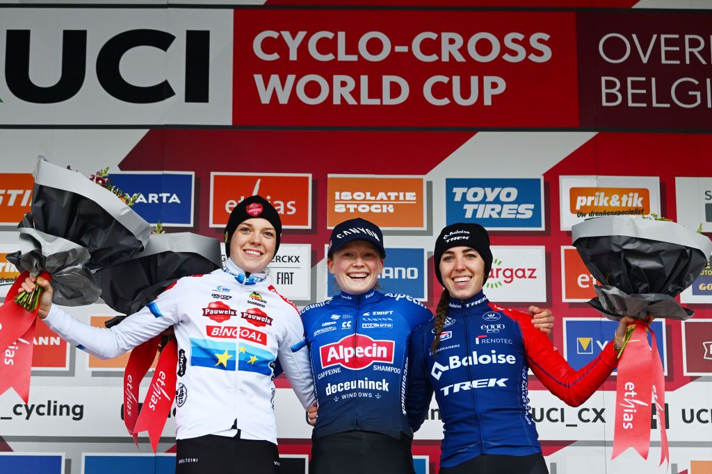 OVERIJSE BELGIUM NOVEMBER 20 LR Fem van Empel of The Netherlands and Team Pauwel Sauzen Bingoal on second place race winner Puck Pieterse of The Netherlands and Team Alpecin Deceuninck and Shirin Van Anrooij of The Netherlands and Team TrekLions on third place pose on the podium ceremony after the 62nd UCI Cyclocross World Cup Druivencross Overijse 2022 Womens Elite CXWorldCup Overijse Cyclocross on November 20 2022 in Overijse Belgium Photo by Luc ClaessenGetty Images