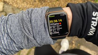 A photo of the Apple Watch 6 showing running stats 