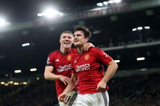 Harry Maguire of Manchester United celebrates after scoring the team's first goal during the UEFA Champions League match between Manchester United and F.C. Copenhagen at Old Trafford on October 24, 2023 in Manchester, England.
