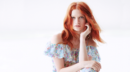 Clothing, Hairstyle, Shoulder, Sitting, Style, Red hair, Dress, Fashion, Beauty, Day dress, 