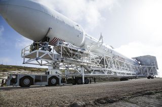 SpaceX's Falcon 9 rocket is moved to the launch pad for the launch of Jason-3, an ocean-monitoring satellite, from California's Vandenberg Air Force Base on Jan. 17, 2016.