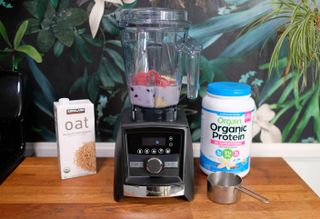 Vitamix A3500 making a blueberry smoothie