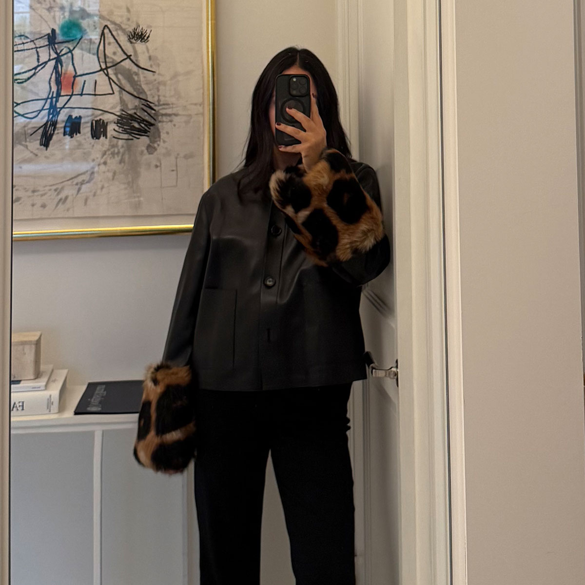 @nicoleakhtarzad loewe leather jacket with leopard cuffs