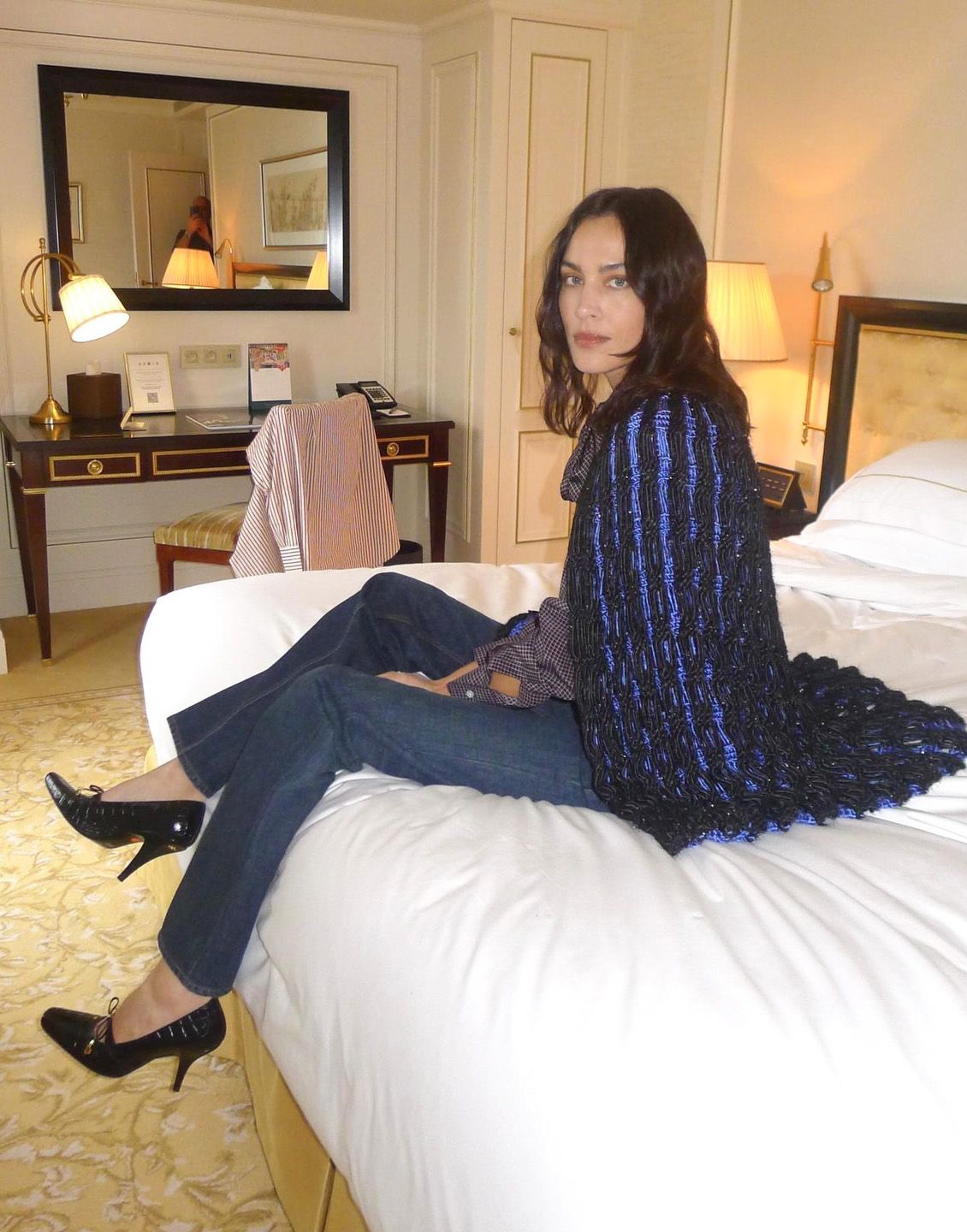 Alexa Chung wearing jeans with bow heels