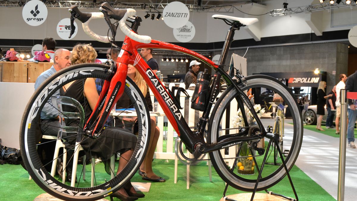 LimeMotion is a French brand making aftermarket electric motors for road bikes. This carbon Carrera has a 35mm diameter motor built into the seat-tube and drives the bottom bracket axle with up to 250W. Remember the stupid (made up) fuss about road pro Fabian Cancellara in 2010 supposedly having a motor in his bike when he won Paris-Roubaix? This makes it look possible. Check out the cranks and rear wheel flying around