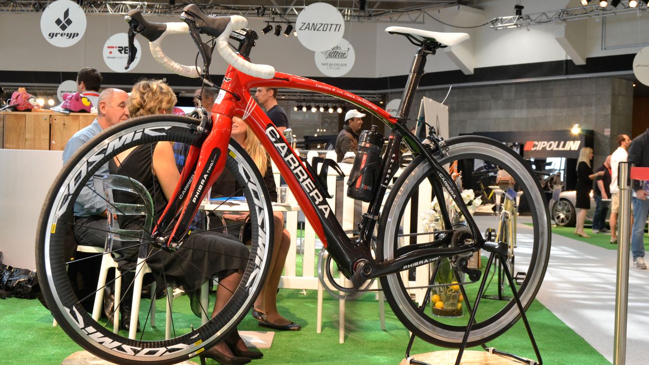 LimeMotion is a French brand making aftermarket electric motors for road bikes. This carbon Carrera has a 35mm diameter motor built into the seat-tube and drives the bottom bracket axle with up to 250W. Remember the stupid (made up) fuss about road pro Fabian Cancellara in 2010 supposedly having a motor in his bike when he won Paris-Roubaix? This makes it look possible. Check out the cranks and rear wheel flying around