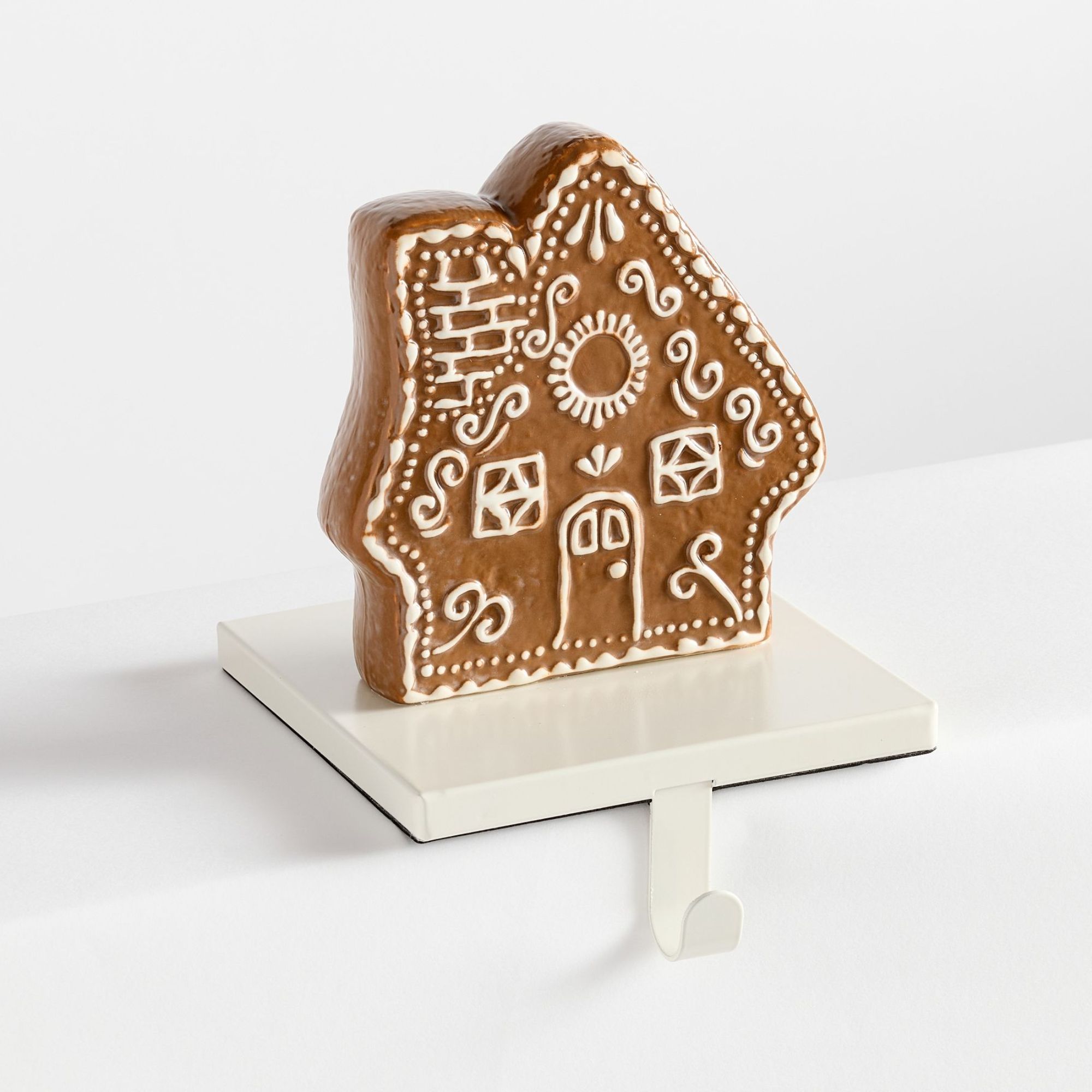Gingerbread house stocking holder with white base