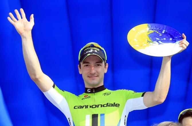 Elia Viviani (Cannondale) shows off his winner's trophy