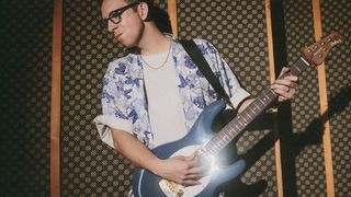 Cory Wong with his Ernie Ball Music Man StingRay II