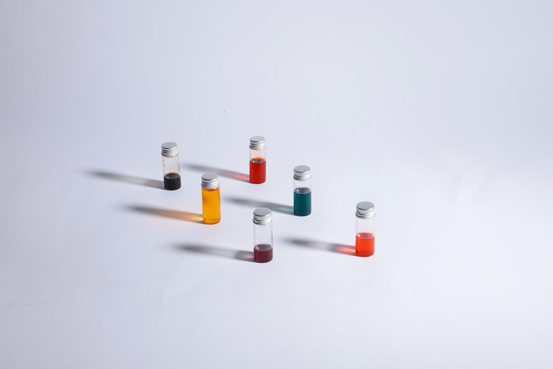 Small vials of colourful liquid