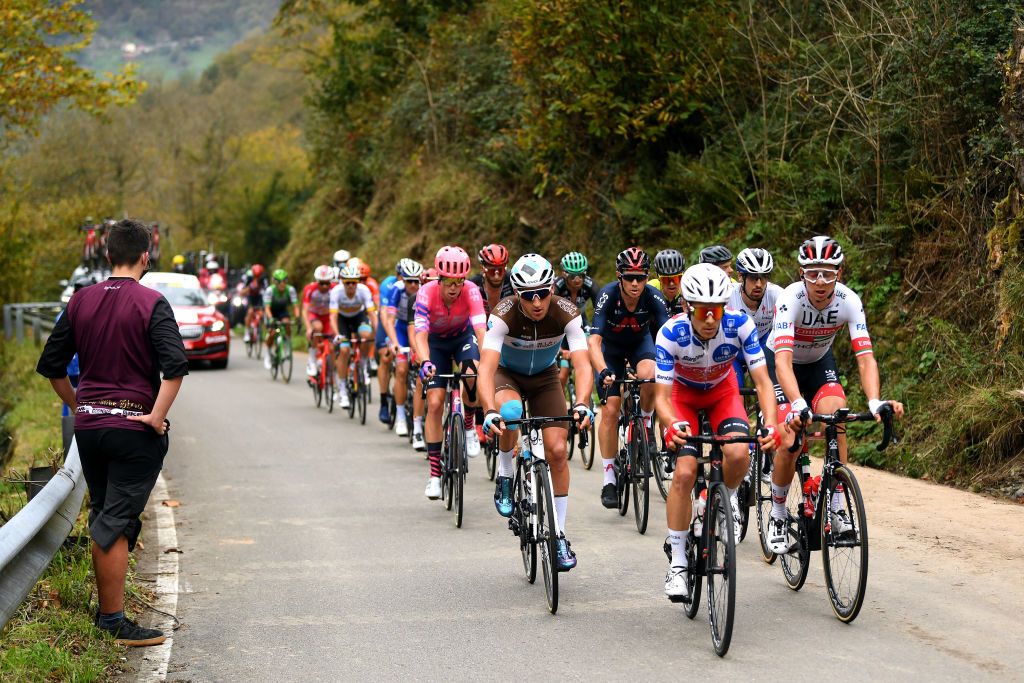 ALTODELANGLIRU SPAIN NOVEMBER 01 Mattia Cattaneo of Italy and Team Deceuninck QuickStep Aliaksandr Riabushenko of Belarus and UAE Team Emirates Luis Leon Sanchez Gil of Spain and Astana Pro Team Andreas Schillinger of Germany and Team BORA Hansgrohe Cameron Wurf of Australia and Team INEOS Grenadiers Robert Stannard of Australia and Team Mitchelton Scott Alexander Edmondson of Australia and Team Mitchelton Scott Anthony Roux of France and Team Groupama FDJ Julius Van Den Berg of The Netherlands and Team EF Pro Cycling Nans Peters of France and Team AG2R La Mondiale Lukasz Wisniowski of Poland and CCC Team Kobe Goossens of Belgium and Team Lotto Soudal Tosh Van Der Sande of Belgium and Team Lotto Soudal Guillaume Martin of France and Team Cofidis Solutions Credits Polka Dot Mountain Jersey PierreLuc Perichon of France and Team Cofidis Solutions Credits Enrico Gasparotto of Switzerland and NTT Pro Cycling Team Imanol Erviti of Spain and Movistar Team Jhojan Orlando Garcia Sosa of Colombia and Team Caja RuralSeguros RGA Angel Madrazo of Spain and Team Burgos BH Breakaway Landscape during the 75th Tour of Spain 2020 Stage 12 a 1094km stage from Pola de Laviana to Alto de lAngliru 1560m lavuelta LaVuelta20 La Vuelta on November 01 2020 in Alto de lAngliru Spain Photo by David RamosGetty Images