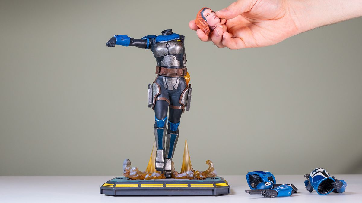 Assembling the Bo-Katan Kryze 1:7 scale statue on a green background