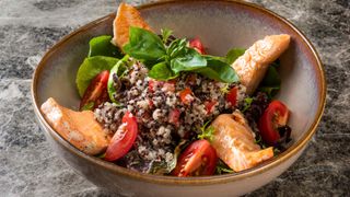 quinoa and salmon salad with tomatoes and avocado