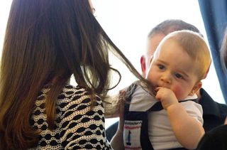 Prince George pulling Kate's hair