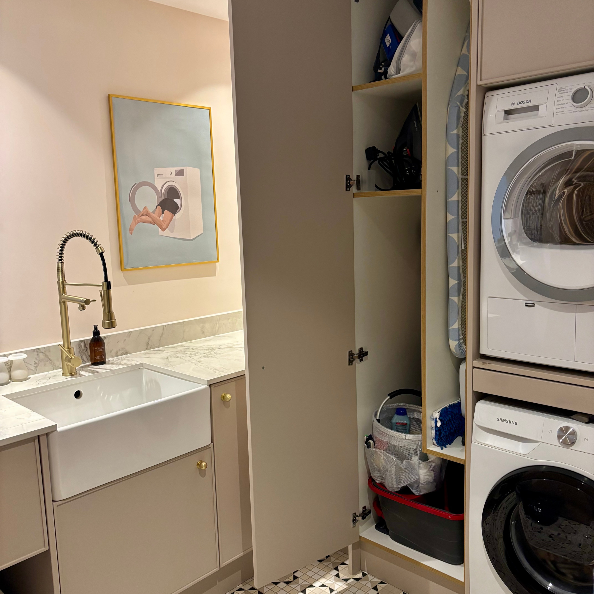 storage cupboard for vacuum, mop and ironing board